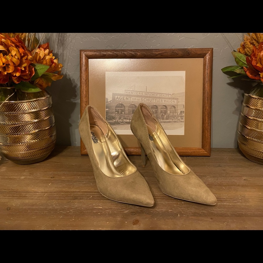 Never worn Nude Pumps. A must have in every closet!